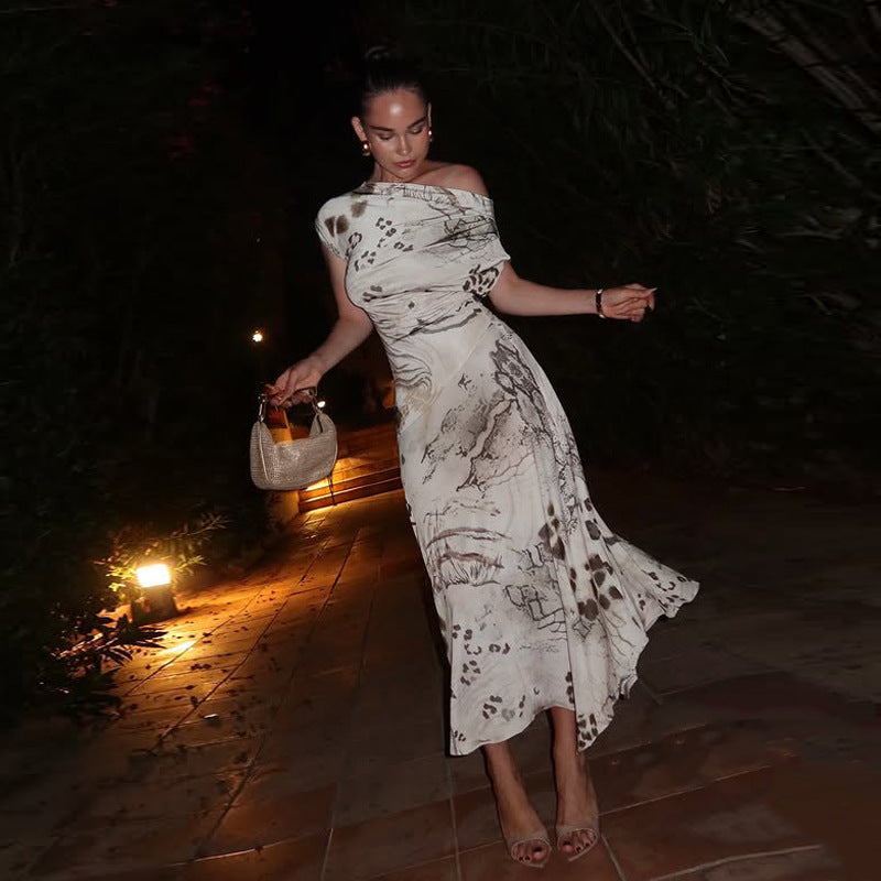 Off-shoulder printed dress with slanted neckline