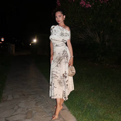 Off-shoulder printed dress with slanted neckline