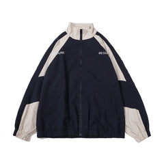 Chaqueta impermeable extragrande con bloques de color