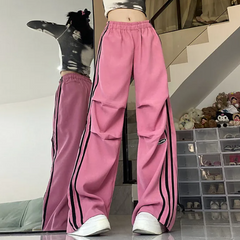 Pantalones deportivos vintage con detalles de ribete plisado